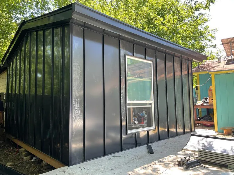 Black standing seam metal wall panels for Roof Inspection in Braintree Town
