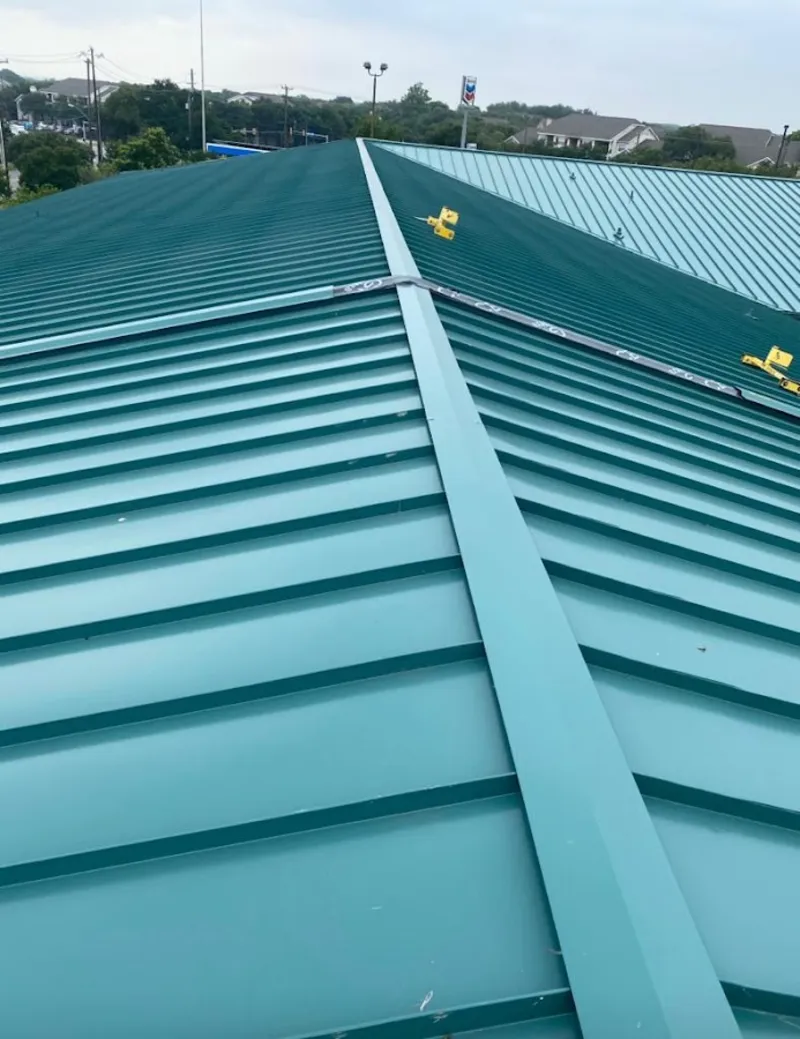 Green commercial metal roof ridge and valley for Metal Roof Repair in Braintree Town